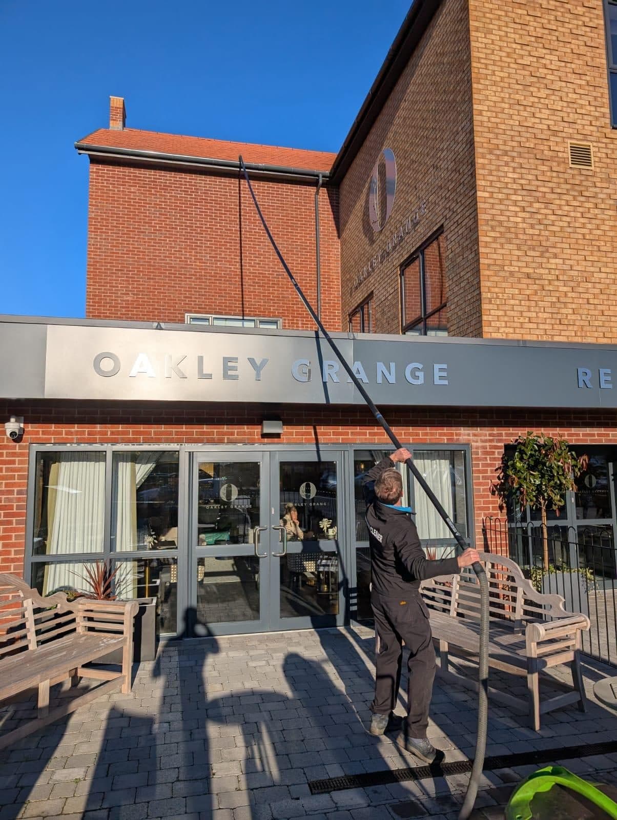 Commercial window cleaning at a care home entrance