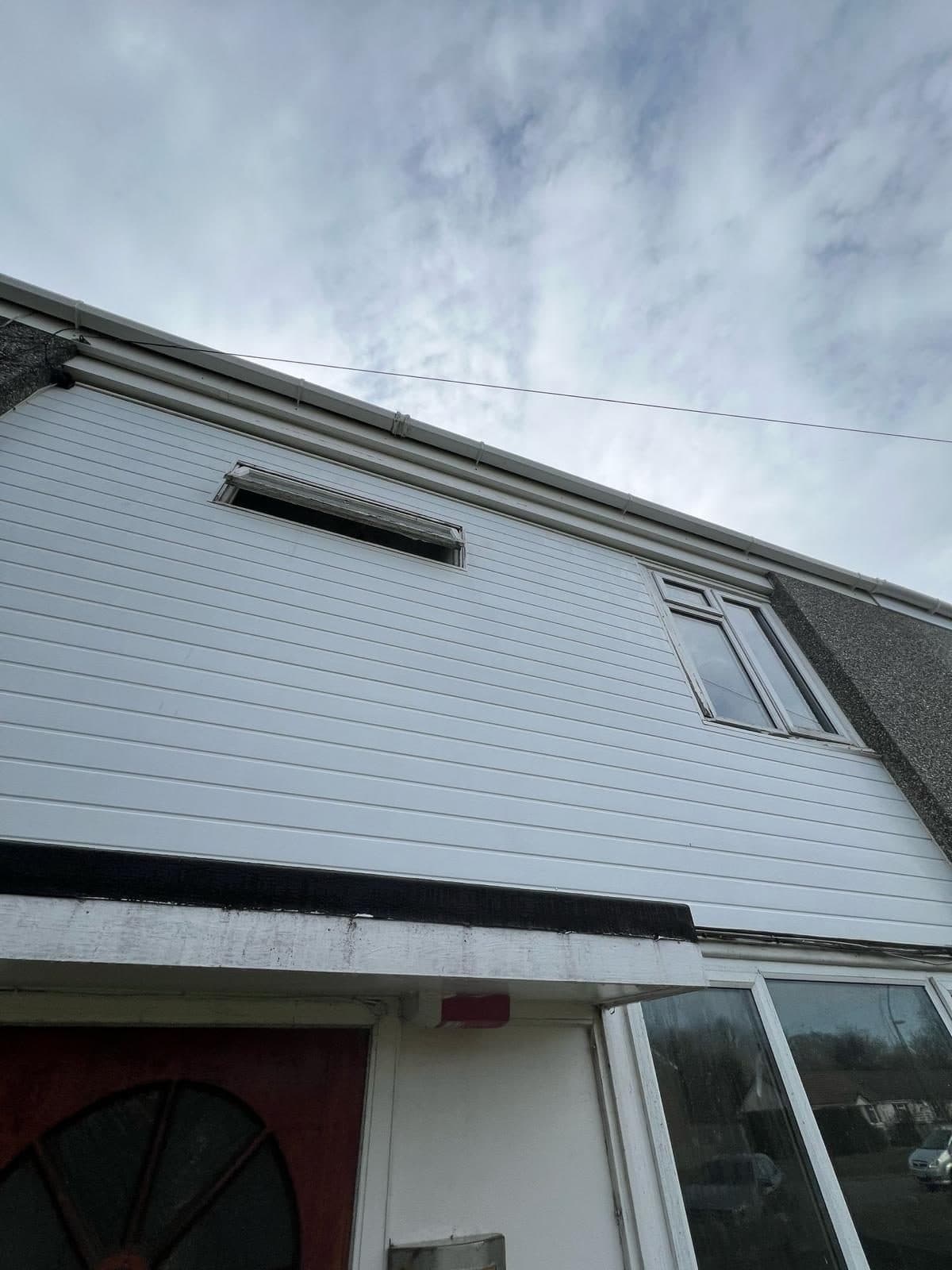 Bright white house cladding after cleaning by D&J Window Cleaners