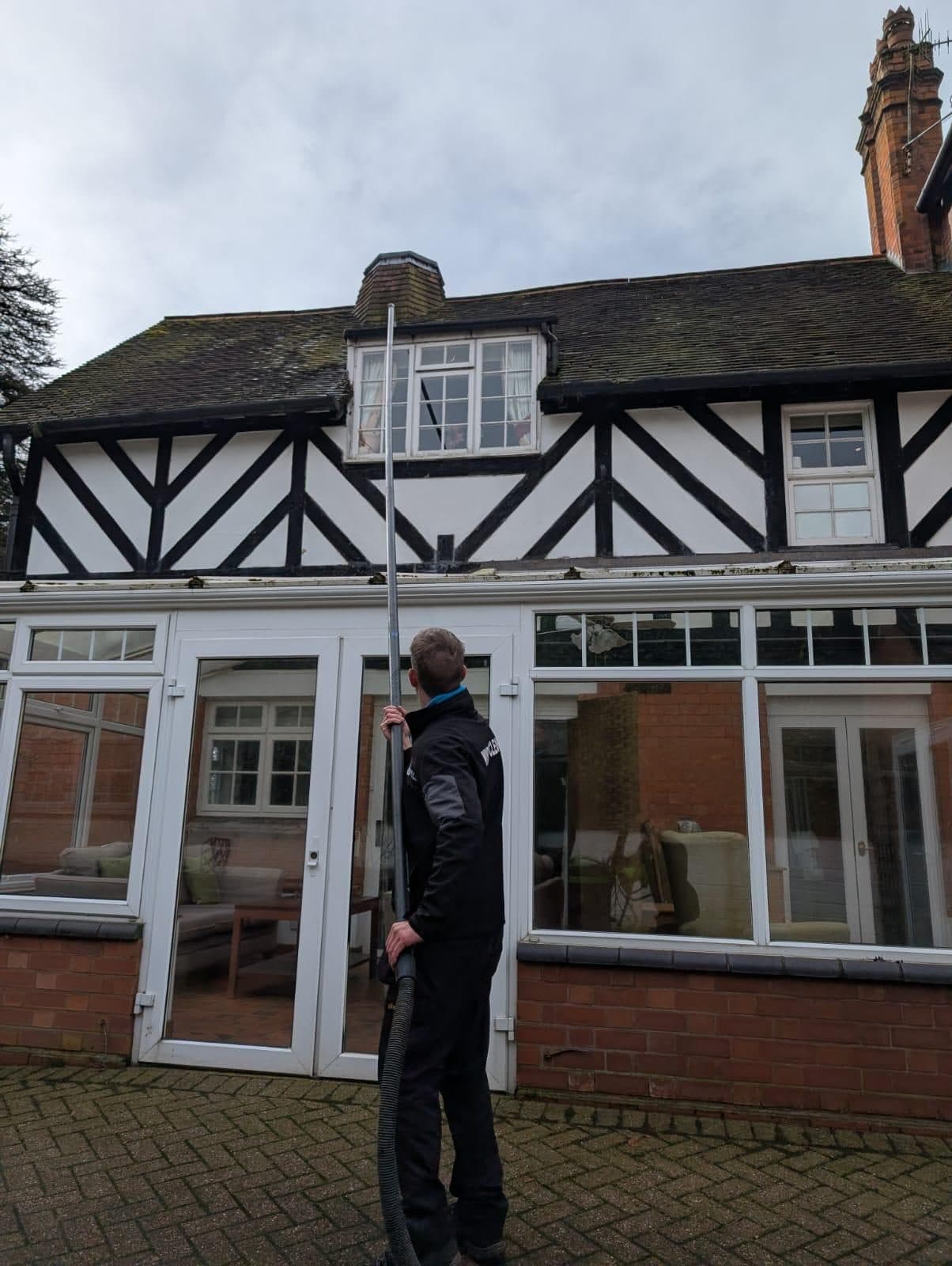 Reach and wash cleaning at a Tudor-style house